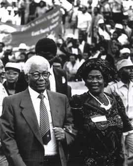 Walter and Albertina Sisulu arrive at the rally to welcome the seven ANC leaders who were release...
