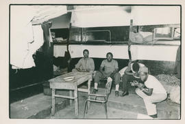 Scene from life in a men's hostel: Views of the inmates in their living quarters