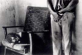 A child of the Dambuza family in their house in Rockville, a squatter camp in Soweto