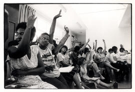 Women raising their hands at the launch of the Federation of Transvaal Women (FEDTRAW)
