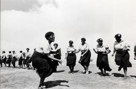 Dancing women (in ANC Women's League uniforms) at a political meeting in the Eastern Cape