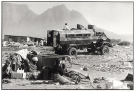 Police casspir and residents of the KTC squatter camp in Cape Town after their violent evacuation...