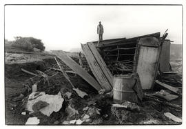 Old man surveys the damage done to his home in the Botha's Hill area during floods which left tho...