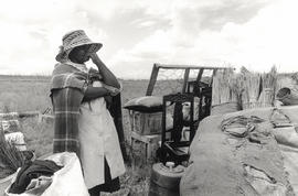 A Ndebele speaking woman with her few possessions, after her resettlement from Moutse to the KwaN...