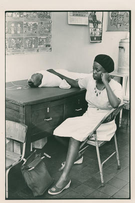 Mother with her child receiving treatment at Alexandra Clinic.