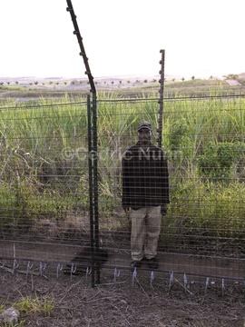 A security guard patrols the to be built Palm Ridge security housing estate in Umhlali, KwaZulu N...